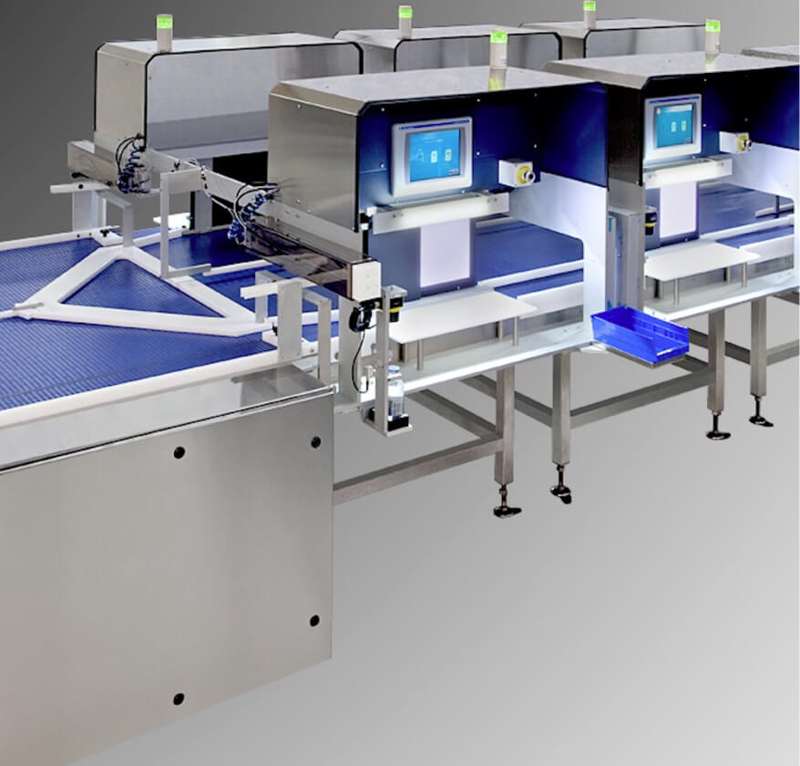Accumulation table integrated with manual inspection hoods (1)